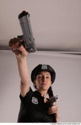 NIKITA POLICEWOMAN WITH TWO GUNS